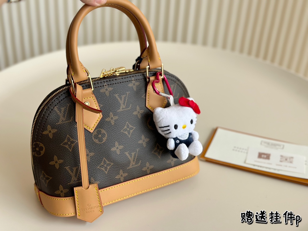 The L Alma Bag by Louis Vuitton is one of its four iconic bags, with dimensions of 24cm by 18cm.